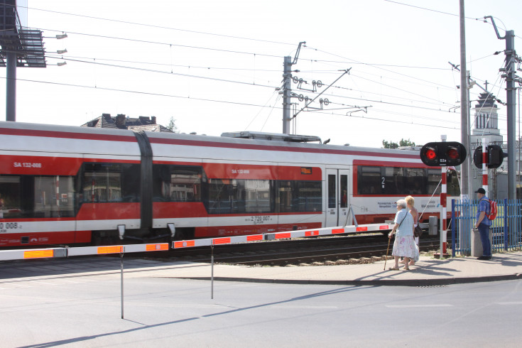 Poznań, bezpieczny przejazd, akcja ulotkowa, żółta naklejka, 112, numer alarmowy