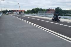 Poznań, przejazd kolejowo-drogowy, nowy wiadukt, motocykl, samochód, nowa infrastruktura, ul. Golęcińska